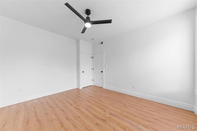 6206 Victoria Ave, Saint Louis, MO 63139 - unfurnished bedroom featuring light wood-style flooring and a ceiling fan