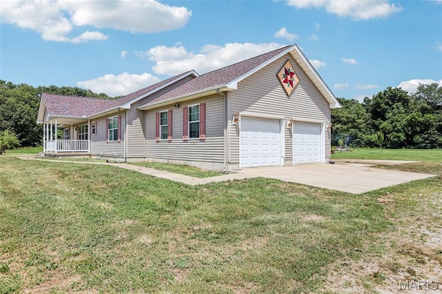 1518 Old Ripley Rd, Sorento, IL 62086 - view of property exterior featuring covered porch, concrete driveway, a lawn, and a shingled roof