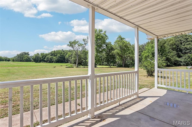 1518 Old Ripley Rd, Sorento, IL 62086 - covered porch with a lawn and view of wooded area