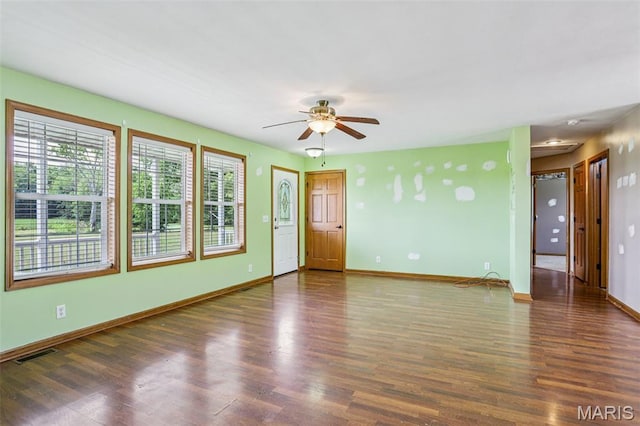 1518 Old Ripley Rd, Sorento, IL 62086 - unfurnished living room featuring wood finished floors and a ceiling fan