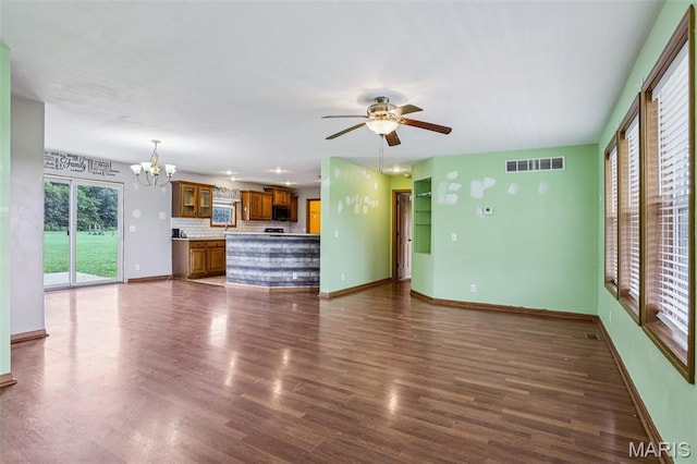 1518 Old Ripley Rd, Sorento, IL 62086 - unfurnished living room featuring a chandelier, dark wood-style flooring, and a ceiling fan