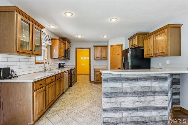 1518 Old Ripley Rd, Sorento, IL 62086 - kitchen featuring black appliances, light countertops, backsplash, glass insert cabinets, and recessed lighting