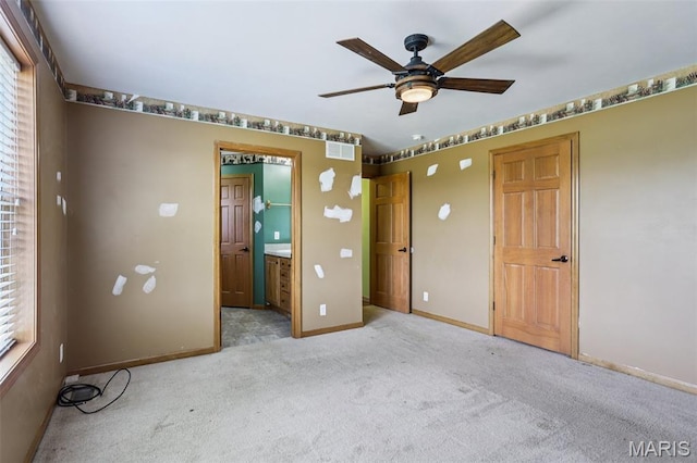 1518 Old Ripley Rd, Sorento, IL 62086 - unfurnished bedroom featuring carpet, ensuite bath, and a ceiling fan