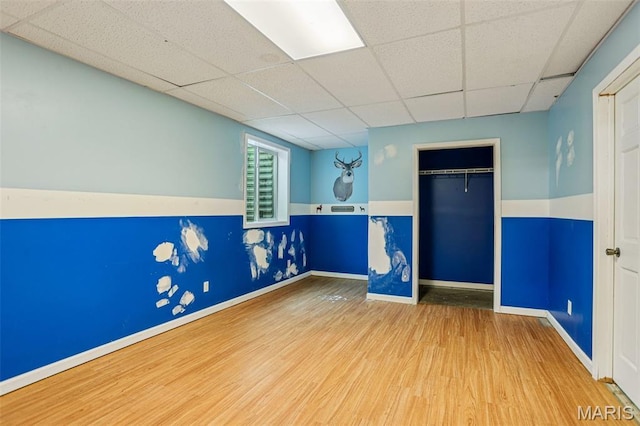 1518 Old Ripley Rd, Sorento, IL 62086 - unfurnished room with wood finished floors and a drop ceiling
