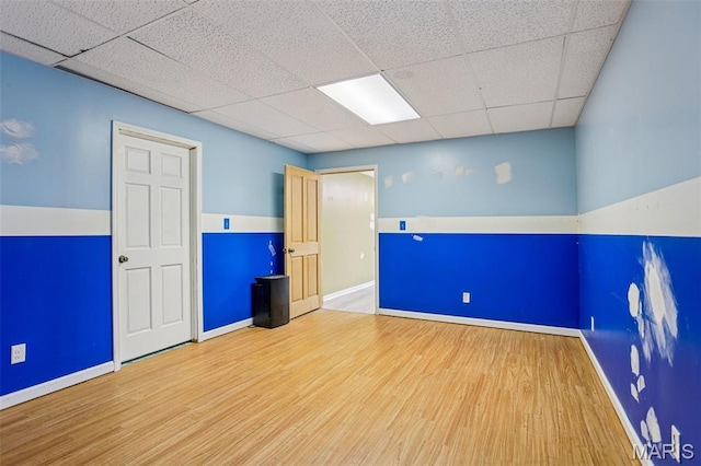 1518 Old Ripley Rd, Sorento, IL 62086 - spare room featuring wood finished floors and a paneled ceiling