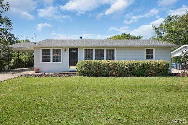 114 Macarthur St, New Haven, MO 63068 - ranch-style home with a front yard, concrete driveway, an attached carport, and a shingled roof
