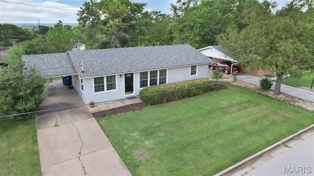 114 Macarthur St, New Haven, MO 63068 - ranch-style home featuring concrete driveway, a front yard, an attached carport, and a shingled roof