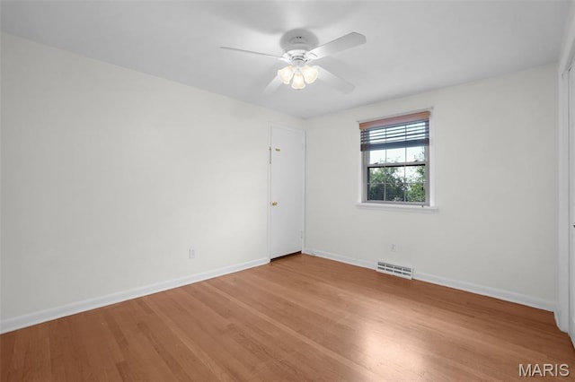 114 Macarthur St, New Haven, MO 63068 - unfurnished room featuring light wood-style floors and a ceiling fan