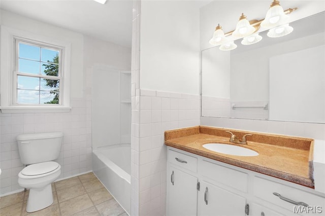 114 Macarthur St, New Haven, MO 63068 - bathroom featuring tile walls, vanity, a wainscoted wall, and tile patterned floors