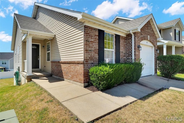 32 Brushy Brook Ct, Ofallon, MO 63366 - view of front of house featuring brick siding, a garage, roof with shingles, and a front yard