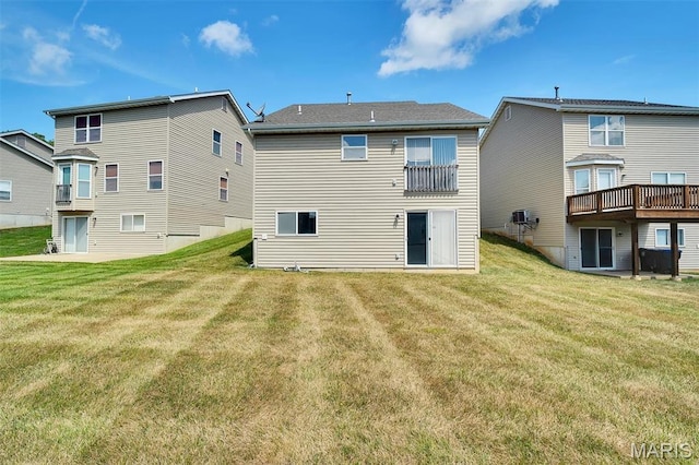 32 Brushy Brook Ct, Ofallon, MO 63366 - back of property featuring a lawn and a wooden deck