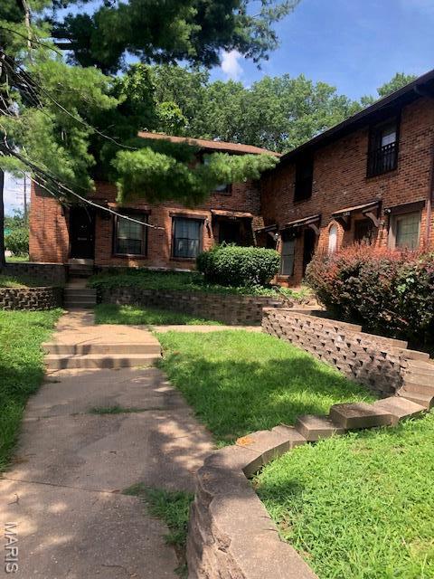 1276 N And S Rd N, University City, MO 63130 - view of front of home with brick siding