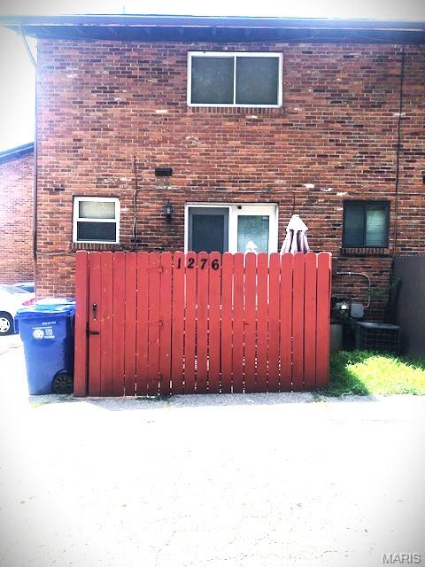 1276 N And S Rd N, University City, MO 63130 - view of side of home with brick siding