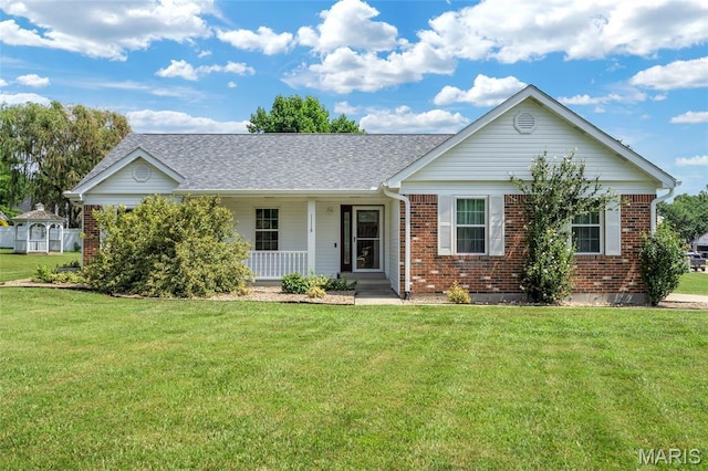 2601 Brookfield Ct, Columbia, IL 62236 - ranch-style home with brick siding, a porch, a front lawn, and a shingled roof