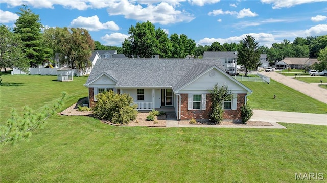 2601 Brookfield Ct, Columbia, IL 62236 - ranch-style home with brick siding, covered porch, a shingled roof, and driveway