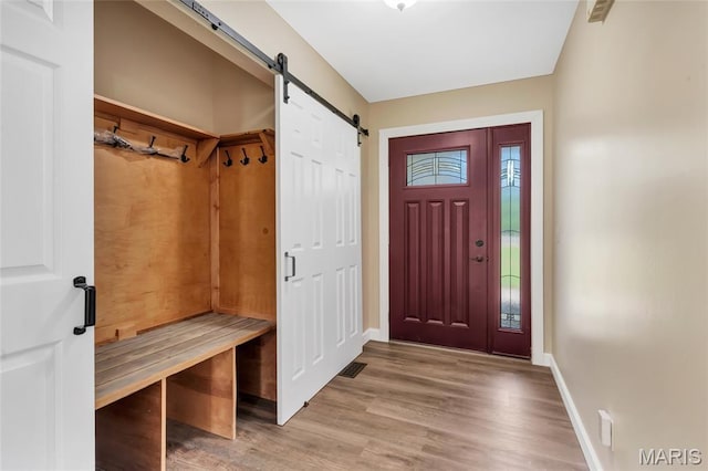 2601 Brookfield Ct, Columbia, IL 62236 - mudroom featuring a barn door and light wood-style floors