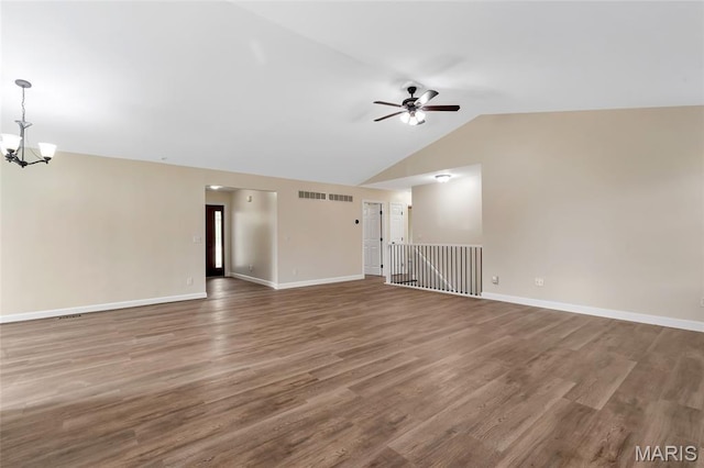 2601 Brookfield Ct, Columbia, IL 62236 - empty room featuring a ceiling fan, a chandelier, lofted ceiling, and wood finished floors