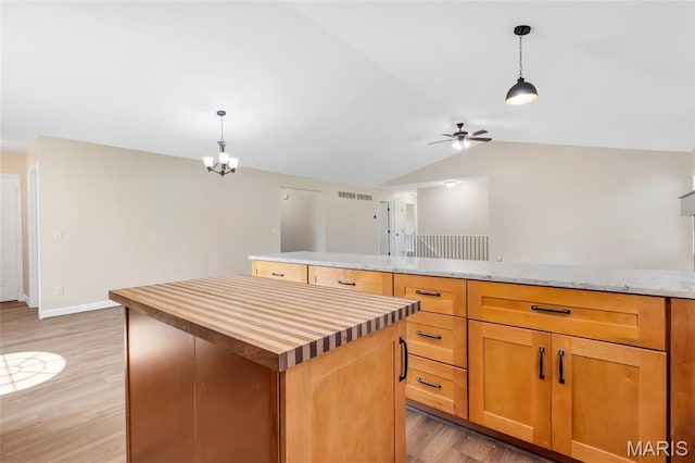 2601 Brookfield Ct, Columbia, IL 62236 - kitchen featuring light wood-type flooring, butcher block counters, a ceiling fan, lofted ceiling, and hanging light fixtures