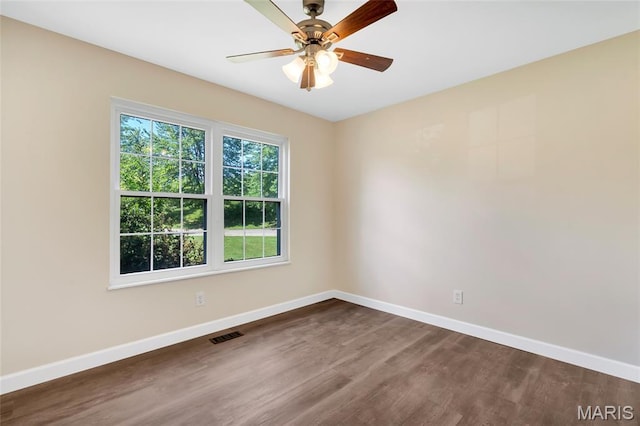 2601 Brookfield Ct, Columbia, IL 62236 - spare room featuring dark wood-style flooring and a ceiling fan