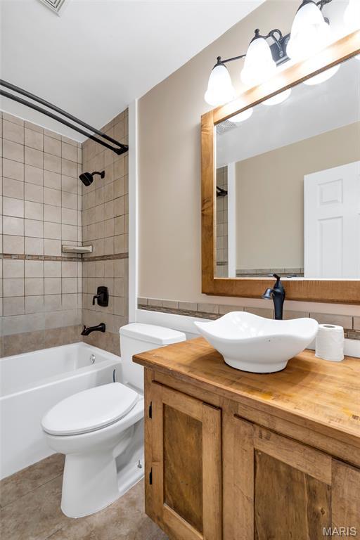 2601 Brookfield Ct, Columbia, IL 62236 - bathroom featuring vanity, tile patterned floors, and bathtub / shower combination