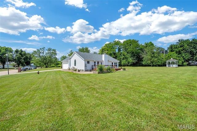 2601 Brookfield Ct, Columbia, IL 62236 - view of green lawn featuring a garage and driveway