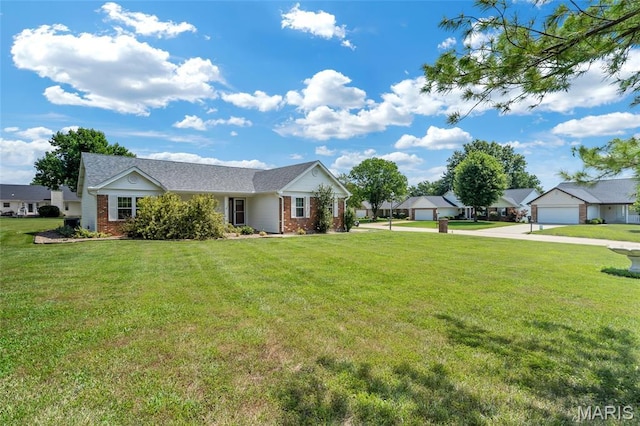 2601 Brookfield Ct, Columbia, IL 62236 - single story home featuring brick siding, a front lawn, driveway, and a garage