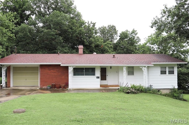 337 S Elm St, Dexter, MO 63841 - ranch-style house featuring a garage, a front yard, a chimney, driveway, and a shingled roof