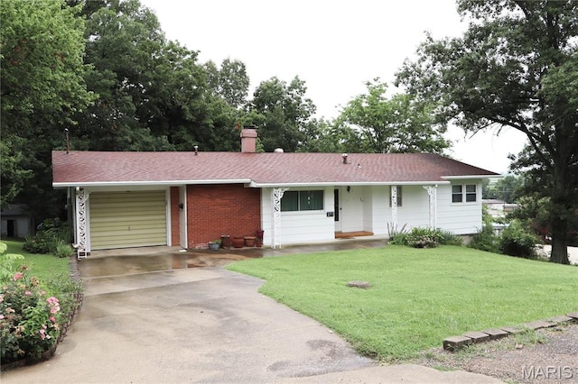 337 S Elm St, Dexter, MO 63841 - ranch-style home with a garage, concrete driveway, a front yard, brick siding, and a chimney