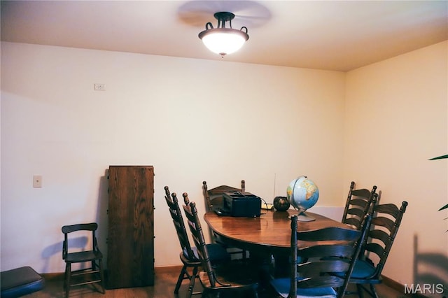 337 S Elm St, Dexter, MO 63841 - dining area featuring wood finished floors