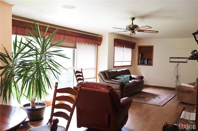 337 S Elm St, Dexter, MO 63841 - living area with a ceiling fan and wood finished floors