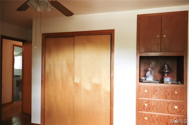 337 S Elm St, Dexter, MO 63841 - unfurnished bedroom with a closet and wood finished floors