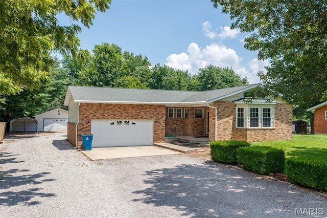 2364 Marine Rd, Highland, IL 62249 - single story home featuring driveway, brick siding, an attached garage, and a front yard