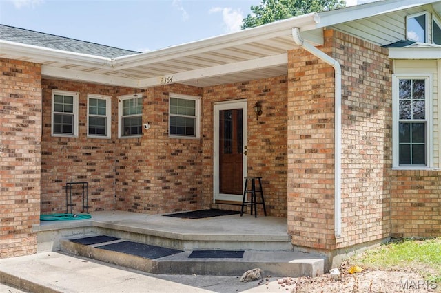 2364 Marine Rd, Highland, IL 62249 - view of exterior entry with brick siding and a shingled roof