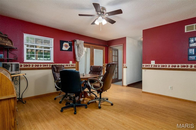 2364 Marine Rd, Highland, IL 62249 - office space with wood finished floors, healthy amount of natural light, a ceiling fan, and a textured ceiling
