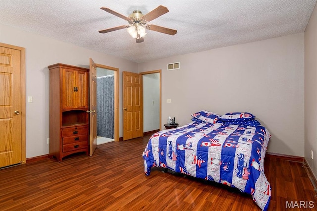 2364 Marine Rd, Highland, IL 62249 - bedroom with wood finished floors, a textured ceiling, and a ceiling fan