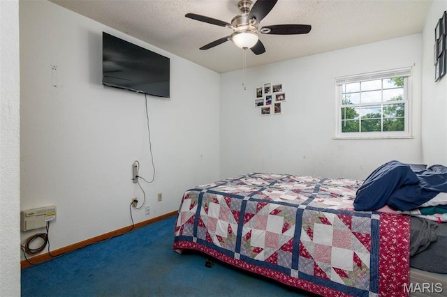 2364 Marine Rd, Highland, IL 62249 - bedroom with carpet flooring, a textured ceiling, and a ceiling fan