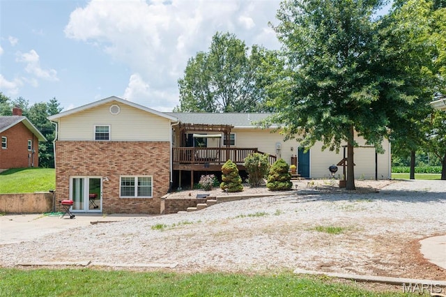 2364 Marine Rd, Highland, IL 62249 - rear view of property featuring a wooden deck and brick siding