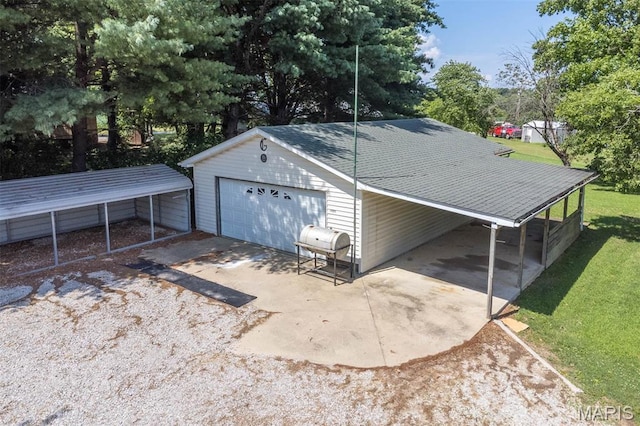2364 Marine Rd, Highland, IL 62249 - garage with a garage and view of wooded area