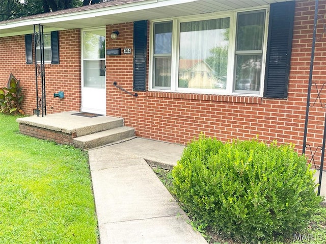 304 W Oak St, Dexter, MO 63841 - entrance to property with brick siding