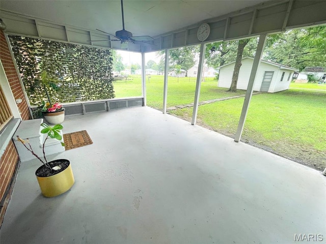 304 W Oak St, Dexter, MO 63841 - unfurnished sunroom featuring a ceiling fan and plenty of natural light