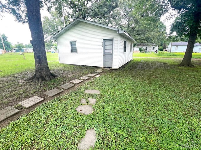 304 W Oak St, Dexter, MO 63841 - view of property exterior with a yard