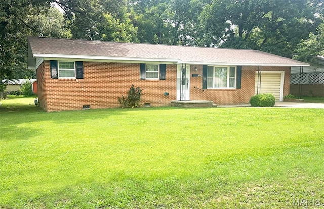 304 W Oak St, Dexter, MO 63841 - ranch-style house featuring crawl space, an attached garage, a front lawn, brick siding, and driveway