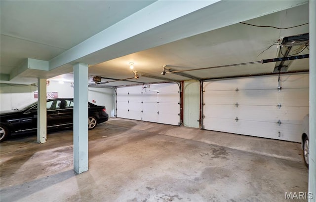 922 Claytonbrook Dr Unit 2, Ballwin, MO 63011 - garage with a garage door opener