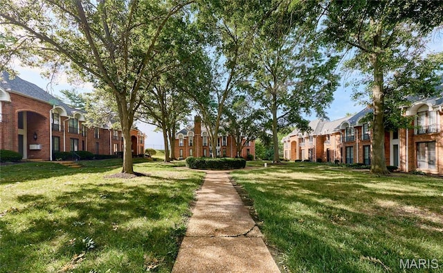 922 Claytonbrook Dr Unit 2, Ballwin, MO 63011 - surrounding community featuring a residential view and a lawn