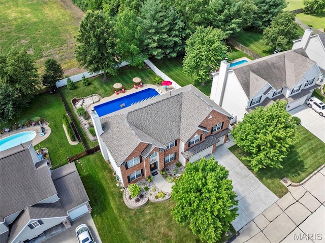 7742 Ardmore Dr, Ofallon, MO 63368 - aerial view of property and surrounding area with a pool