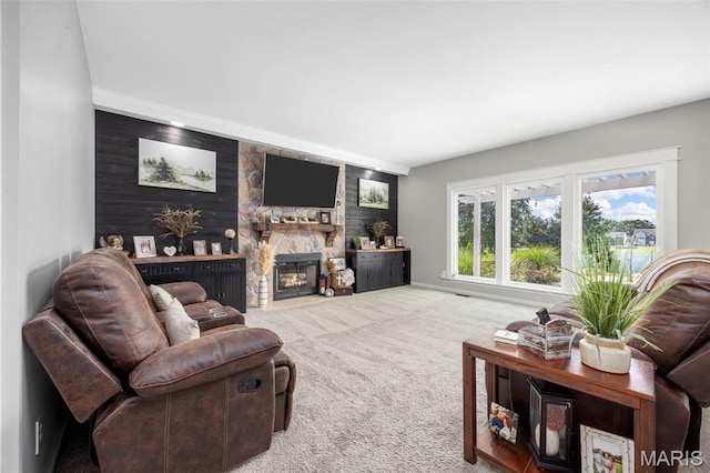 7742 Ardmore Dr, Ofallon, MO 63368 - carpeted living area with a fireplace