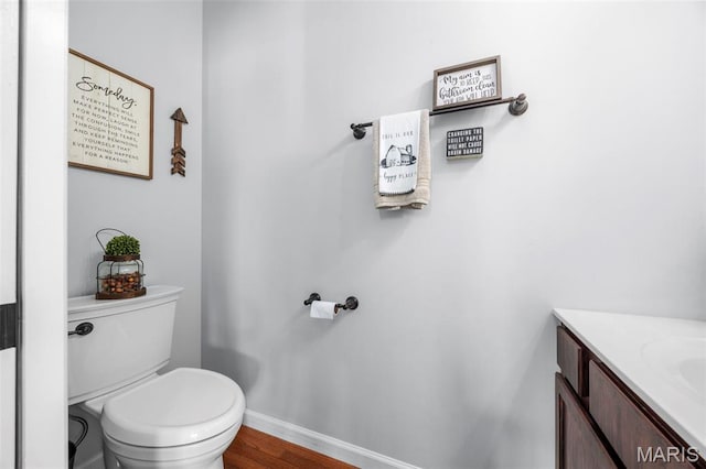 7742 Ardmore Dr, Ofallon, MO 63368 - half bath with vanity and wood finished floors