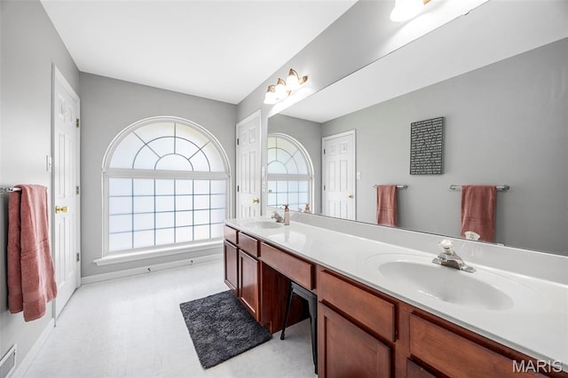 7742 Ardmore Dr, Ofallon, MO 63368 - bathroom with tile patterned floors, double vanity, and healthy amount of natural light