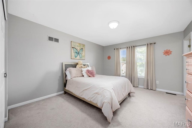 7742 Ardmore Dr, Ofallon, MO 63368 - bedroom featuring light colored carpet and baseboards