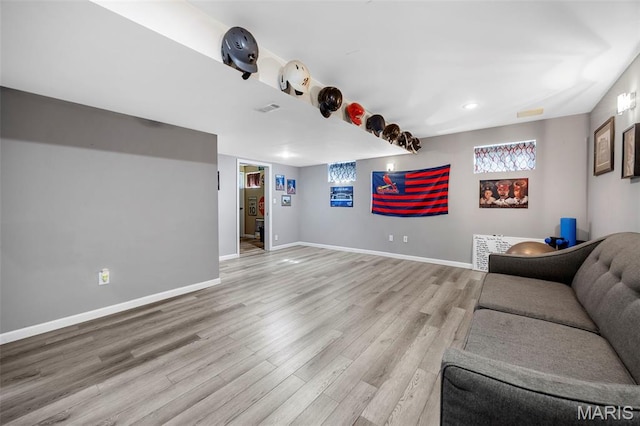 7742 Ardmore Dr, Ofallon, MO 63368 - living room with light wood-style flooring and baseboards